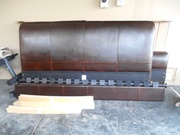 King size brown leather bed