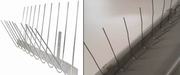 Stainless steel gutter spikes against pigeons and seagulls
