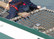 Safety netting with fiberglass wire