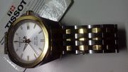 Gold & Silver TISSOT watch.