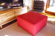 Ottoman,  never used. Dense foam,  upholstered  on MDF base.